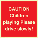 caution-children-playing-please-drive-slowly~